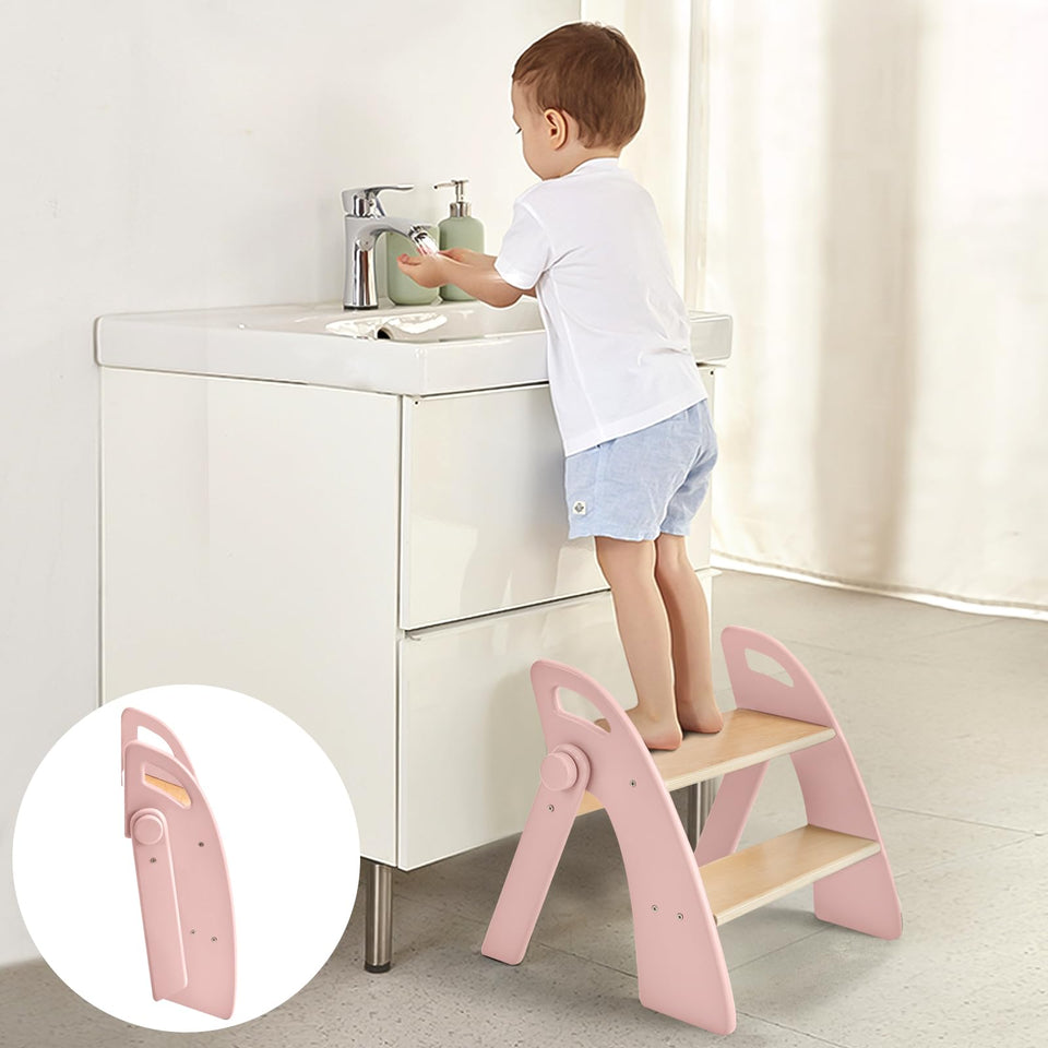 Joothlin wooden 2-step stool pink folded for compact storage.