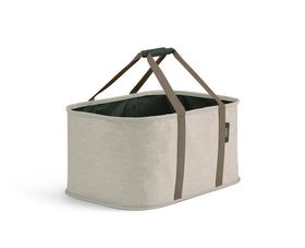Joseph Joseph Hold-All collapsible basket 35L shown folded, ideal for small-space storage.