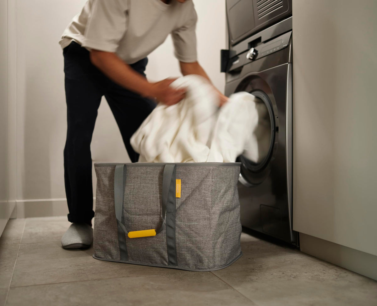 Joseph Joseph Hold-All Max interior moisture resistant for damp laundry.