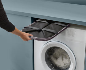 Joseph Joseph Hold-All Max with strong carry handles for convenient transport.