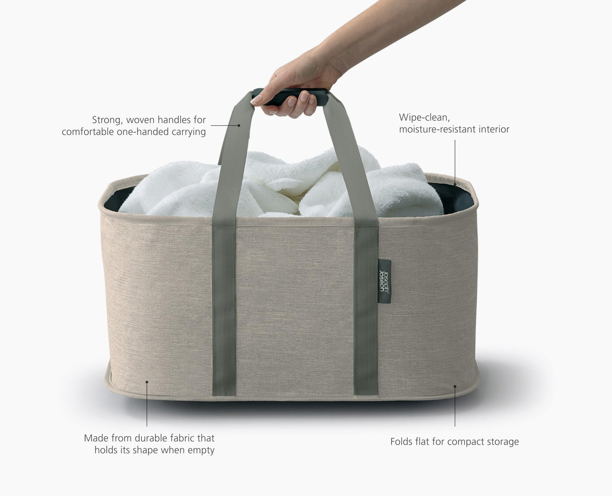 Joseph Joseph Hold-All woven handles enable comfortable transport.