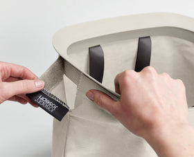 Joseph Joseph Tota base helper handle simplifies emptying into washer