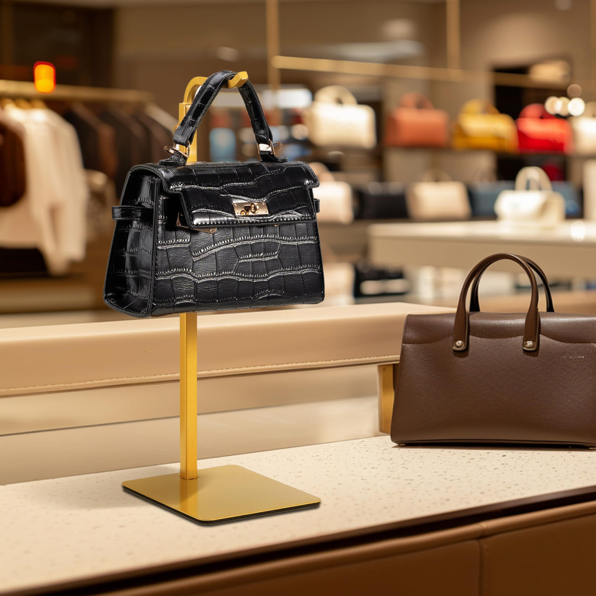 Josmimic gold hook stand illustrates adjustable versatility for bags and accessories.
