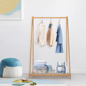 Jotsport bamboo child garment rack with storage shelf in natural finish.