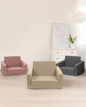 Grey Jouha chair fits living rooms, bedrooms, and play areas.
