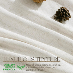 Jowels ivory semi-sheer linen curtains diffuse daylight softly.