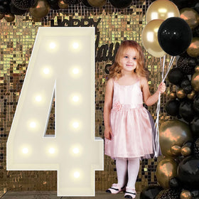 JoyBox Design 4ft marquee number frame illuminates dramatic celebrations.