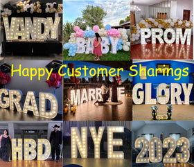 JoyBox Design baby shower decor using marquee letter A for dramatic backdrop.