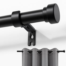Joydeco adjustable curtain rod extended 16 to 120 inches to fit varied windows.