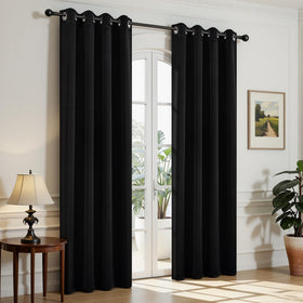 Joydeco blackout curtains in a bedroom setup blocking light for calmer mornings
