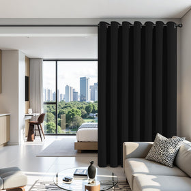 Joydeco room-divider curtains provide privacy while defining living spaces.