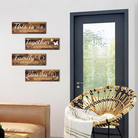 Joyhawk wall art set display helps complete a home vignette.