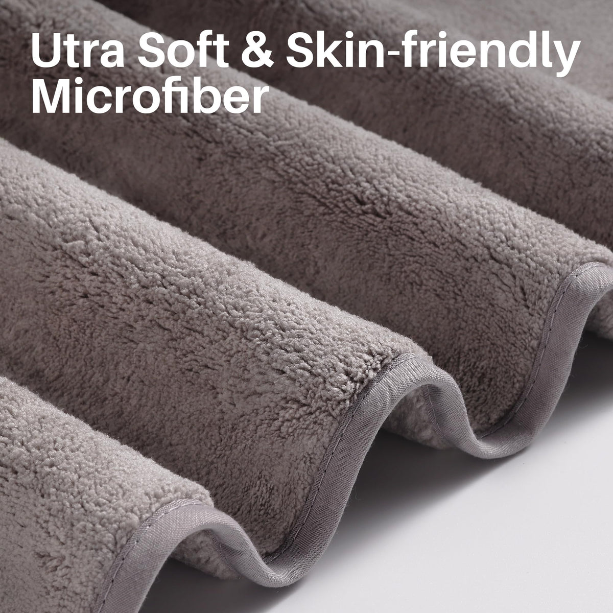 JOYMOOP bath towel durable weaving closeup demonstrates long-lasting softness after repeated washes.