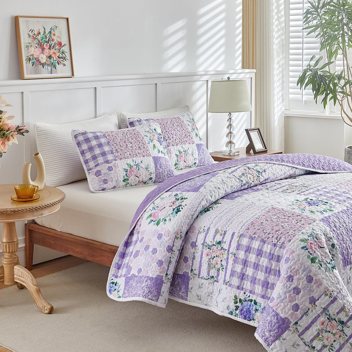 Joyreap pillow sham closeup showing coordinated floral accent with the quilt.