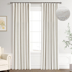 Joywell blackout curtains in cream ivory two-panel set framing a window for light control