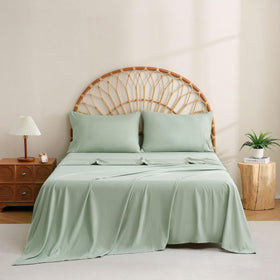 Sage green color from JSD bedding creates a calm bedroom look