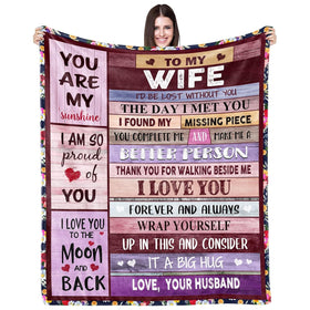 JTUOW blanket gift for wife shown during unboxing, highlighting thoughtful wrapping and anticipation.
