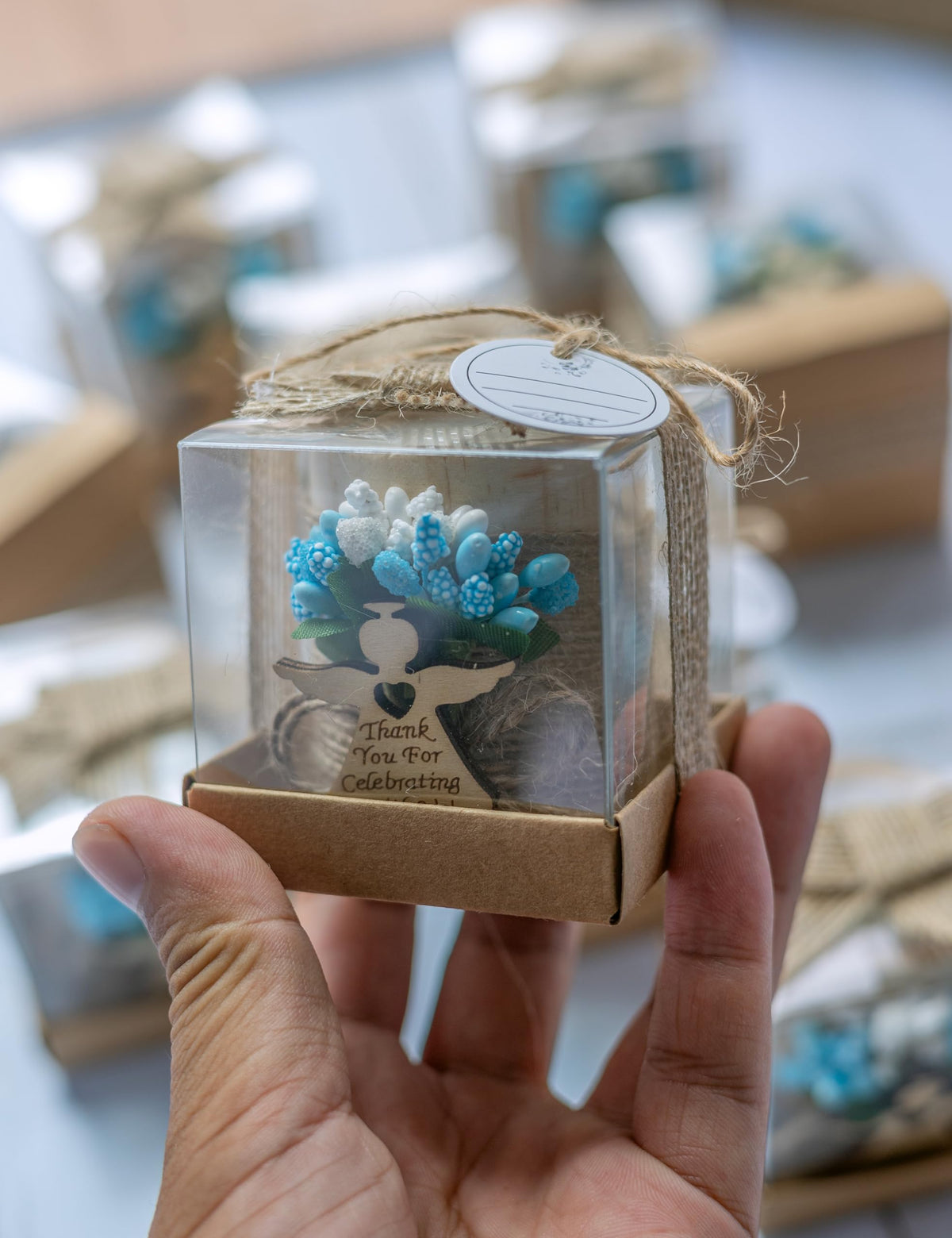 Ju's Favors light brown blue tealight holder complements various themes.