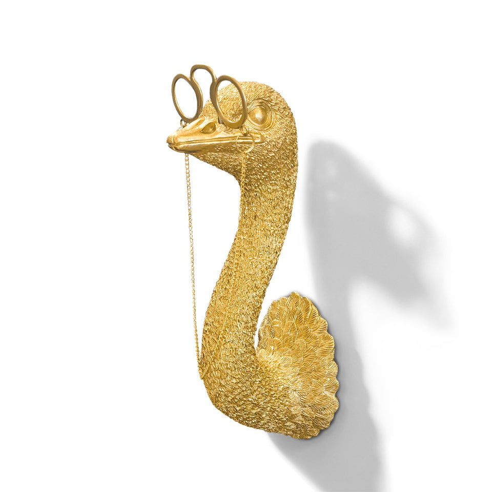 Juedawyal gold ostrich head wall decor adds a playful focal point and conversation starter.