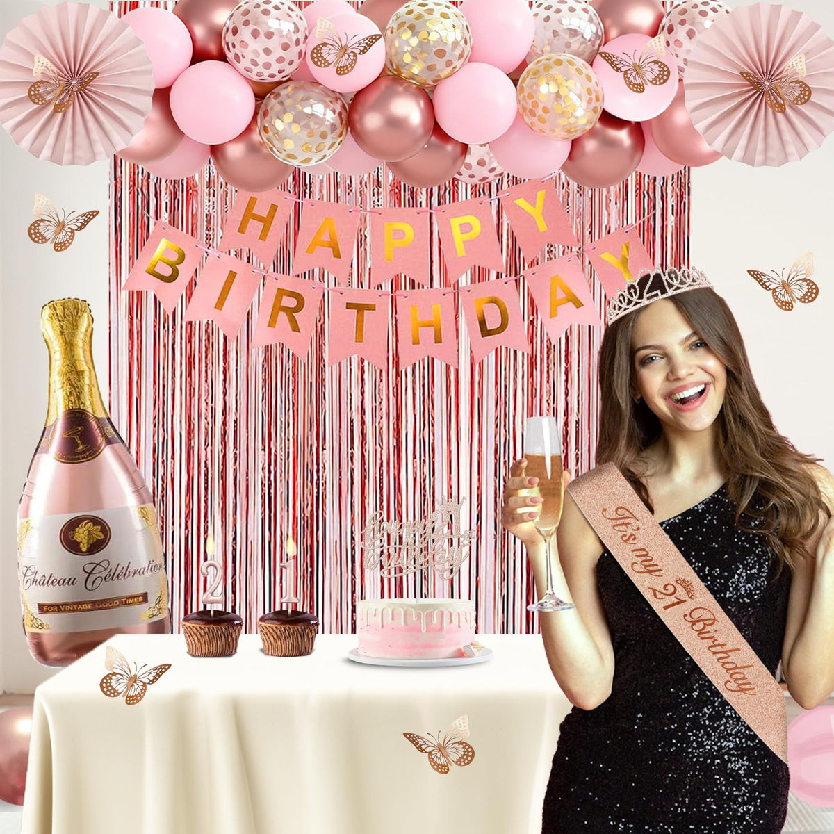 Juesly hanging pink paper fans add soft color and depth to the party backdrop.