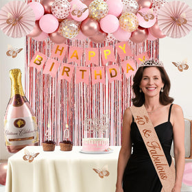 Juesly fringe curtains in rose gold create a chic backdrop for photos.