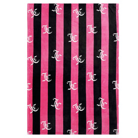 Cozy living room scene featuring the Juicy Couture Cabana Plush throw.