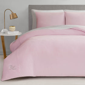 Juicy Couture Marshmallow Pink Velour comforter close-up with rhinestone logo for luxe glamour