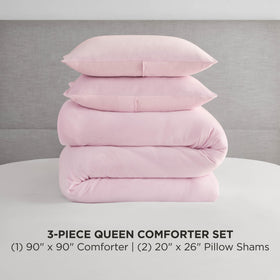 Juicy Couture marshmallow pink velour comforter set folded, showcasing plush texture and soft warmth