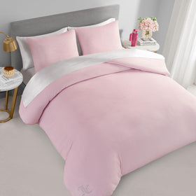 Close-up of Juicy Couture rhinestone logo on comforter highlighting glam detail for stylish bedrooms