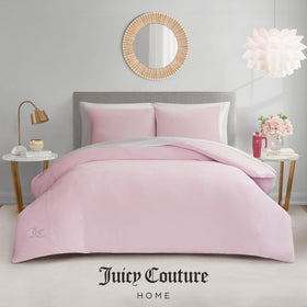 Juicy Couture machine washable care tag emphasizes easy maintenance for busy bedrooms