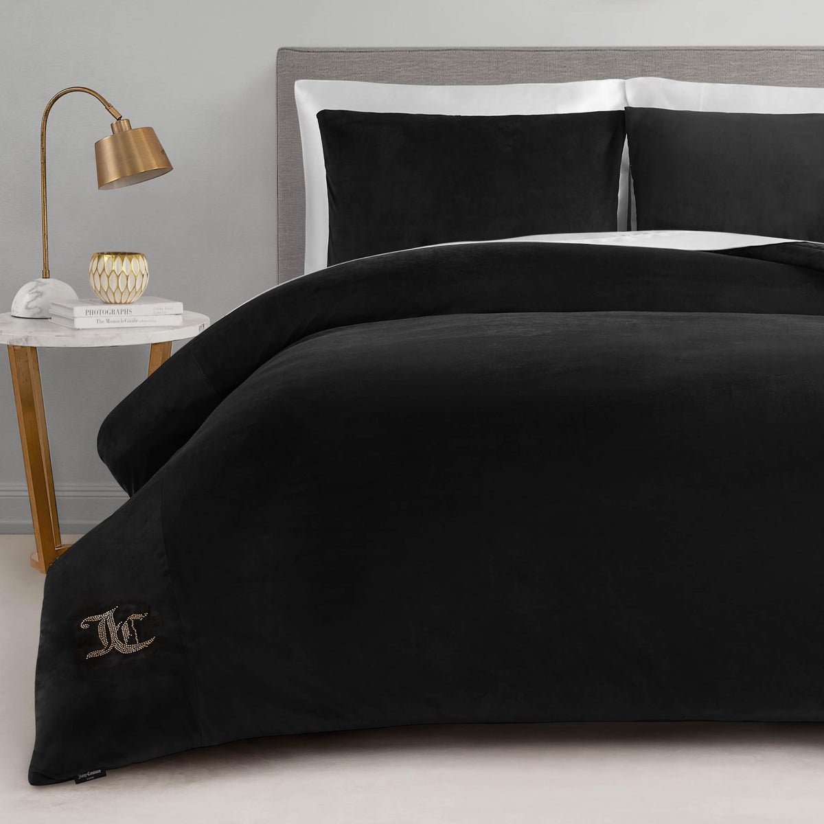 Juicy Couture black velour comforter set, plush warmth for the bedroom.