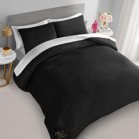 Juicy Couture sleeping shams paired with velour comforter.