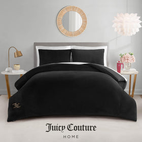 Stitching detail on Juicy Couture comforter highlighting durability.