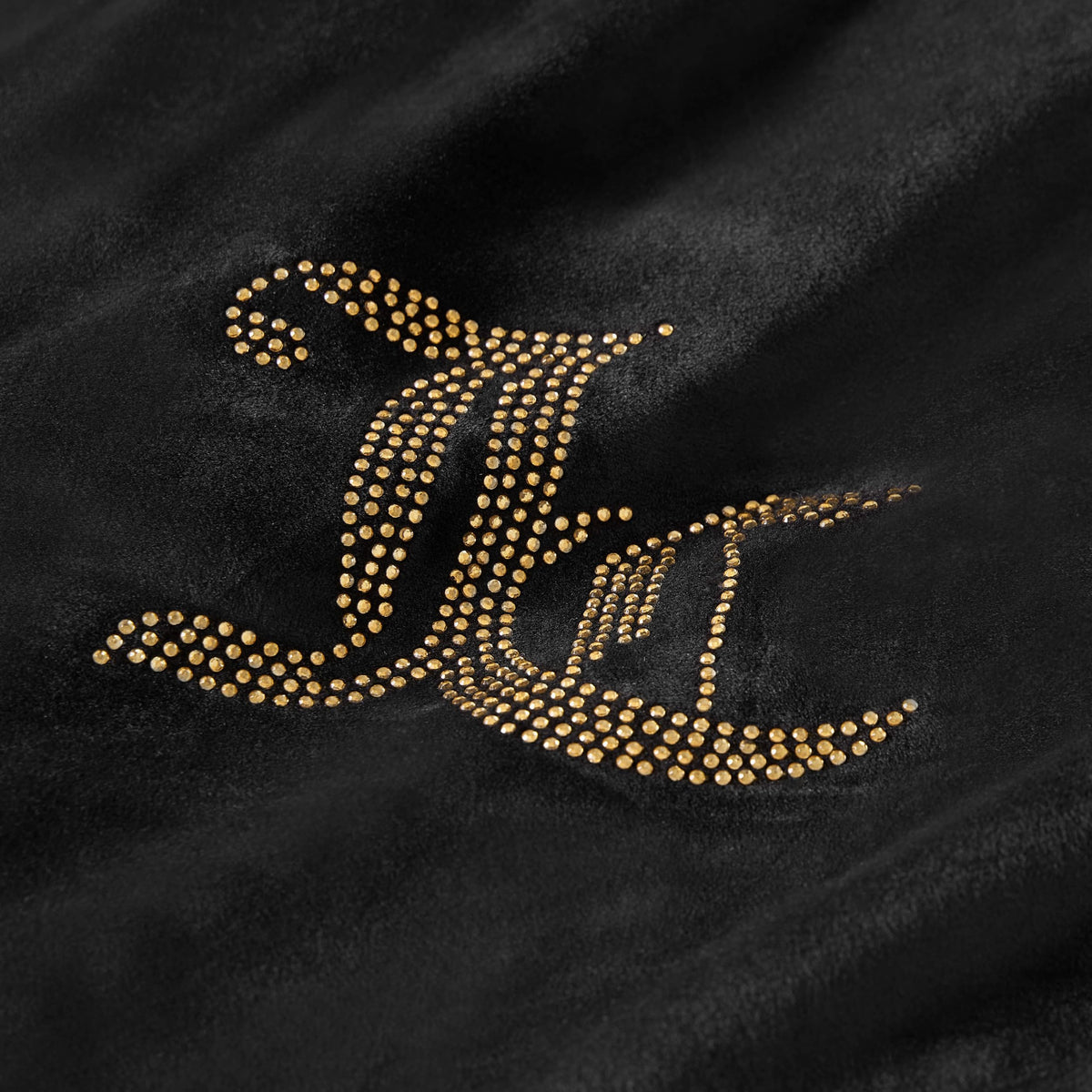 Close up of velour fabric texture for a soft, luxurious feel.
