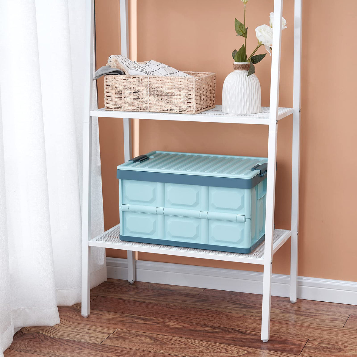 JUJIAJIA blue crate used for toy storage in living room.