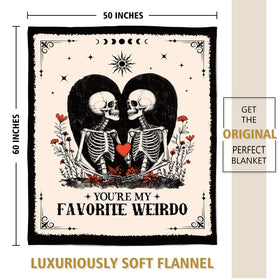 Juratar blanket laid on a bed creates cozy wedding night vibes.