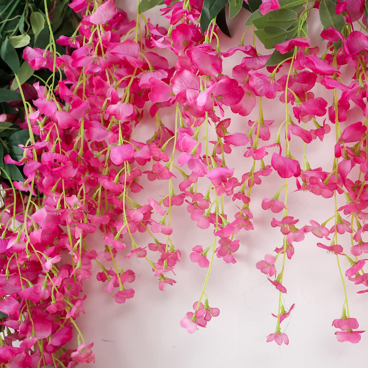 JUSTOYOU wisteria garland features 12 faux heads for colorful focal points.