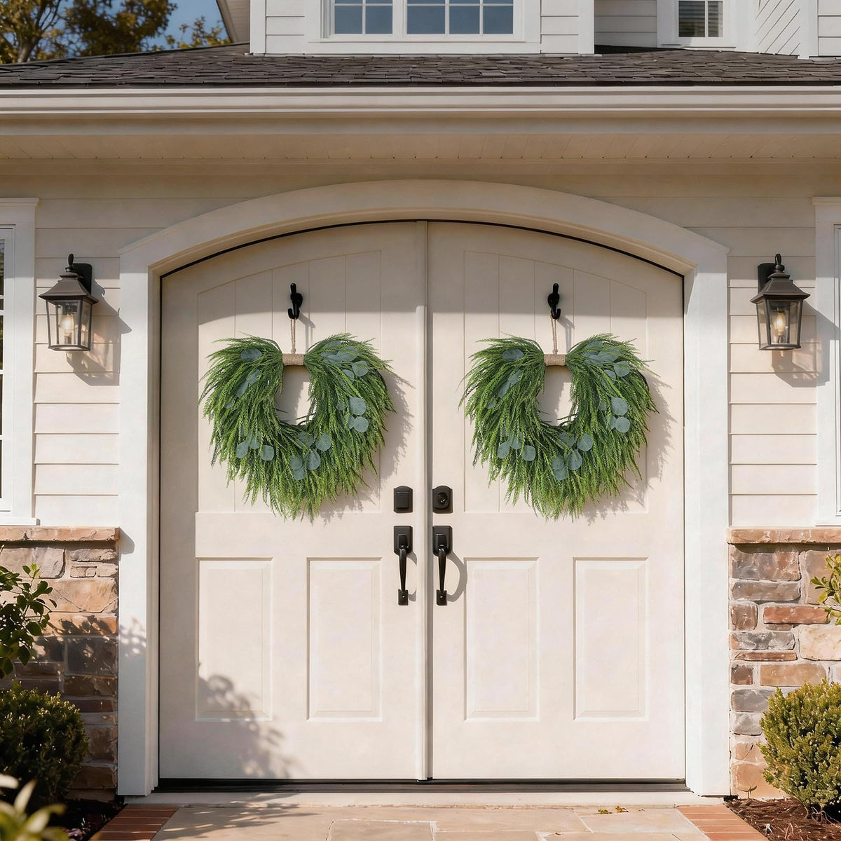 Juxdp 22-inch artificial wreath; weatherproof greenery for outdoor use.