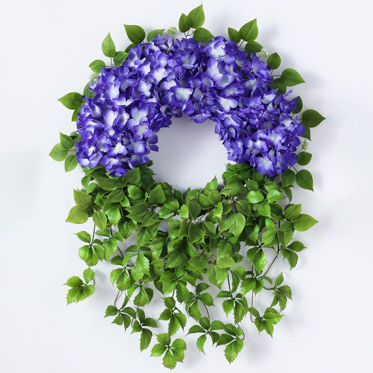 Juxdp wreath on front door with lush purple hydrangea for curb appeal