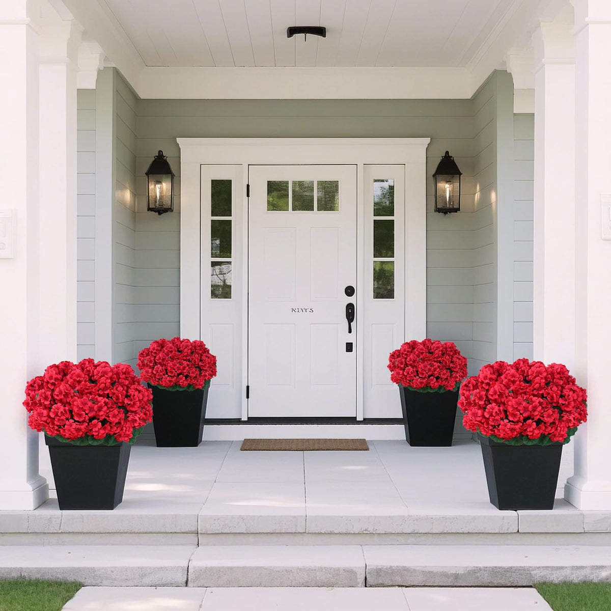 Juxdp artificial geraniums showcased on front porch planters.