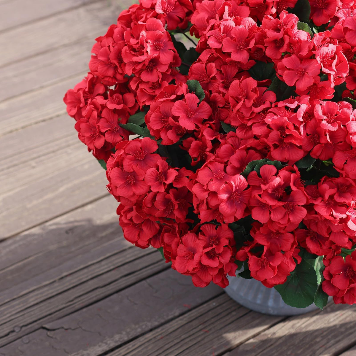 Juxdp silk flower heads with sturdy stems endure weather.