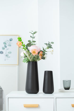 JUZAI minimalist ceramic vase adds a refined accent to mantle or side table.