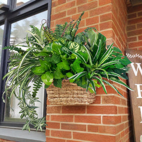 KAFDY artificial greenery is a backyard filler that withstands weather.