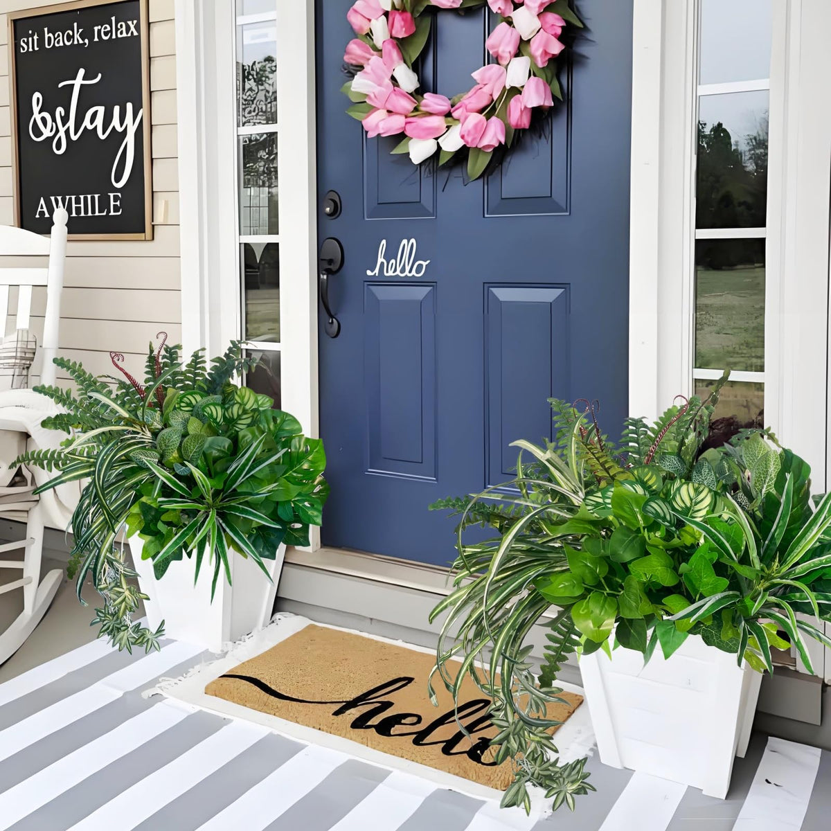 KAFDY faux greenery front door arrangement looks lifelike and inviting.
