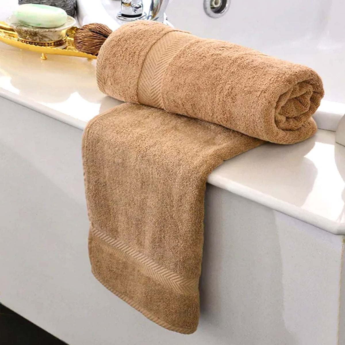 Towels from KAHAF COLLECTION displaying soft plush texture and color richness