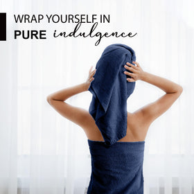 KAHAF COLLECTION quick-dry navy towel 24x48, ideal for poolside use.