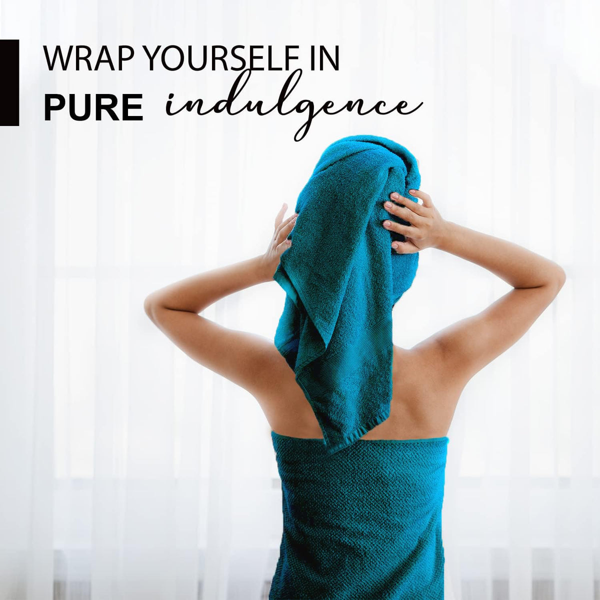 KAHAF COLLECTION teal towel folded displaying generous 24x48 inch size