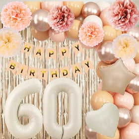 KAINSY dusty pink paper pom poms add soft, festive texture.