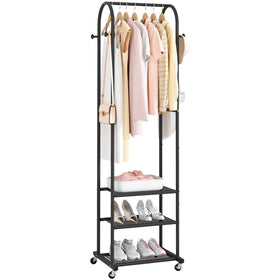 Kaitiemoo heavy duty clothing rack with wheels for easy mobility around laundry spaces.