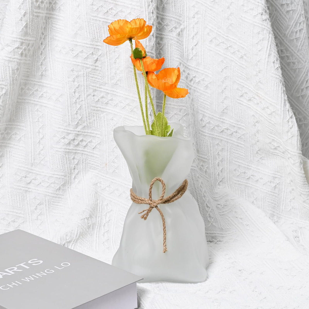Kaitnax vase narrow mouth ideal for a single stem centerpiece.
